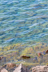 A view of the Shore and Rocks in the Water at Agawa Bay, in Ontario, Canada.