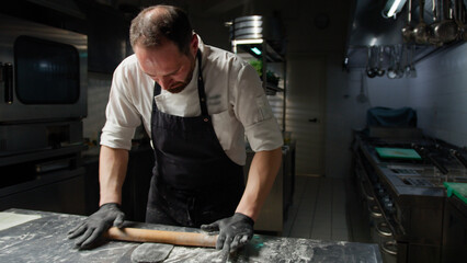 The Black Dough Creation With The Rolling Pin
