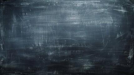 07231249 74. Erased chalkboard with faint traces of chalk dust and a clean surface, ready for new text or educational illustrations, providing a minimalist and textured background