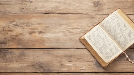 Fototapeta premium Open Book on Rustic Wooden Table