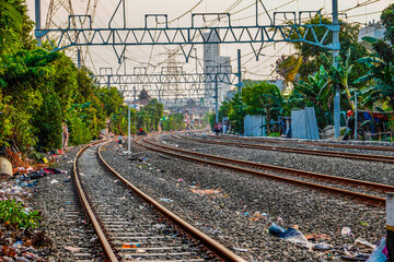 railway line, with cable lines on electricity poles.