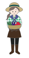 野菜をもつ農家の若い女性