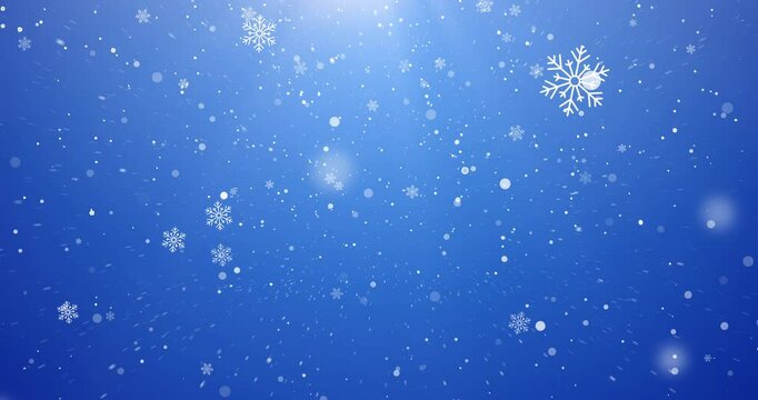 Christmas, particles and snowflakes on blue background space for digital card, creativity and festive season. Snow animation, bokeh spots and glitter on wallpaper for texture, sparkle and celebration