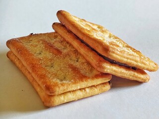 a stack of biscuits on an isolated white background