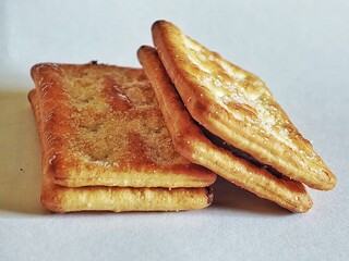 a stack of biscuits on an isolated white background