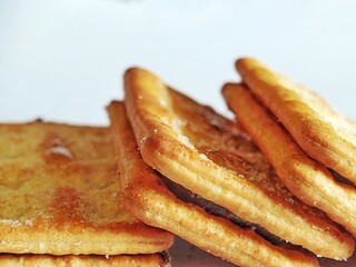 a stack of biscuits on an isolated white background