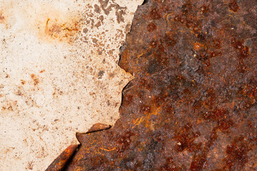 The surface of the metal is covered with rust
