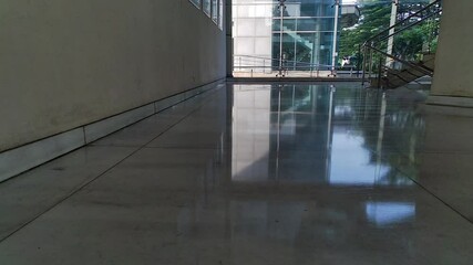 Close-up of professional cleaner or janitor washing floor with cleaning services and moving day concept for office, building or university.