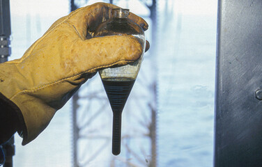 First oil sample is taken on the Sedco offshore drilling rig.