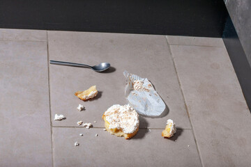 brownie smashed on a tiled floor