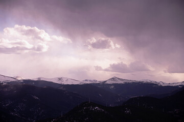 snowstorm coming in over the distant mountains