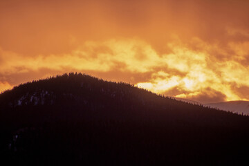 Sky alight with color in the colorado rocky mountains