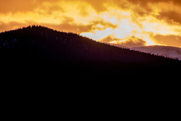 Sky alight with color in the colorado rocky mountains