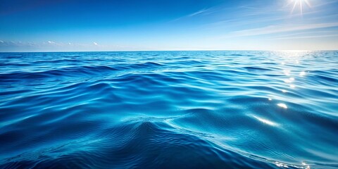 Blue water with gentle waves creating a calming surface background