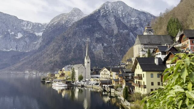 Hallstatt on a quiet early Spring morning, with beautiful reflections on the water and no tourists