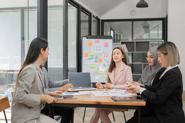 Asia business meeting   consultations of business people in the company's meeting room. 