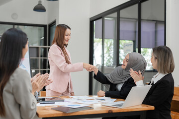 Asian Business Group Chat about graph work Present in meetings, in the office