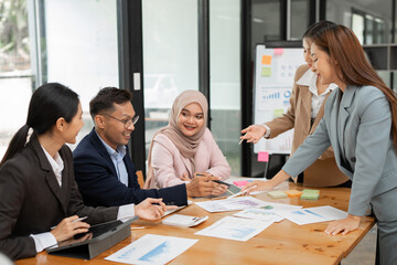 Asia business meeting   consultations of business people in the company's meeting room. 