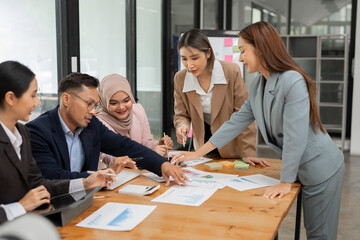 Asia business meeting   consultations of business people in the company's meeting room. 