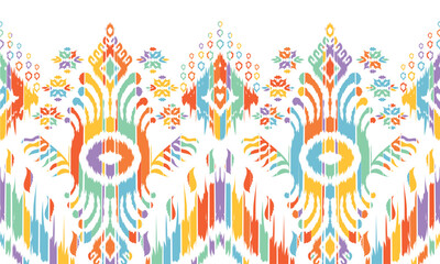 Fototapeta premium Ikat seamless pattern,geometric design,motif ethnic handmade, Ikat ethnic tribal,boho colors seamless wallpaper. for background,fabric,wrapping,clothing,wallpaper,Batik,carpet,embroidery style.