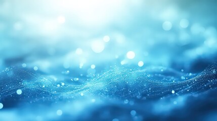  serene abstract scene of glowing blue waves with sparkling particles, bathed in soft light, evoking a tranquil and ethereal underwater atmosphere.