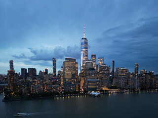 Obraz premium NYC aerial night view. New York City skyline, cityscape of Manhattan in USA. New York City NYC Manhattan Downtown Skyline, from Jersey City USA.