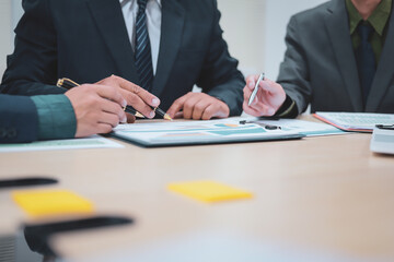 A lawyer meets with clients in a professional office, offering expert legal consultation and...
