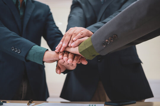 A lawyer meets with clients in a professional office, offering expert legal consultation and representation. Specializing in business planning, they operate within private firms or as freelance