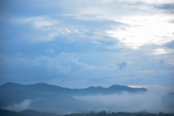 Photograph of a misty mountain sky in the morning