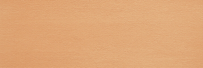 a seamless texture of slightly textured colored paper in pale cinnamon color