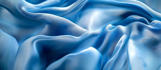 Obraz premium Blurred abstract background created by a blue fabric with wavy patterns suitable for a copy space image