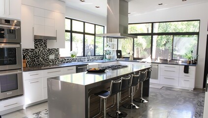 Fototapeta premium Modern Kitchen with Stainless Steel Appliances and Island Seating