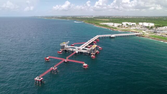 Aerial Orbit of Coastal Fuel Refinery Pipelines Platform Port, Dominican