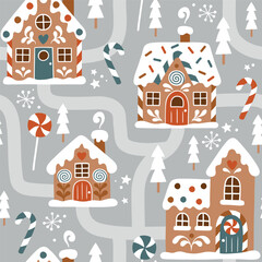 Seamless vector pattern with hand drawn gingerbread houses and Christmas trees. Snowy landscape with winter village. Perfect for textile, wallpaper or print design.