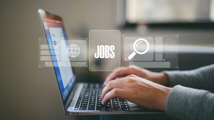 Online Job Search on Laptop with Icons, A person searching for job opportunities online using a laptop in a modern office setting.	