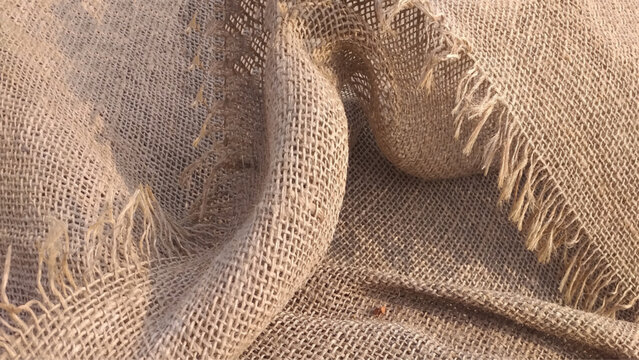 Close up burlap texture for background. Old folded jute background.