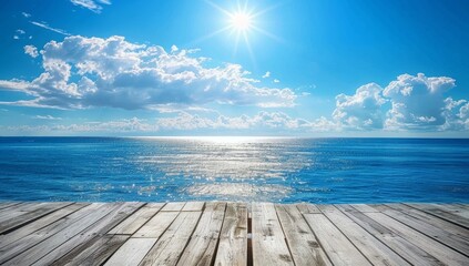 Obraz premium Wooden Deck Overlooking a Bright Blue Ocean Under a Sunny Sky