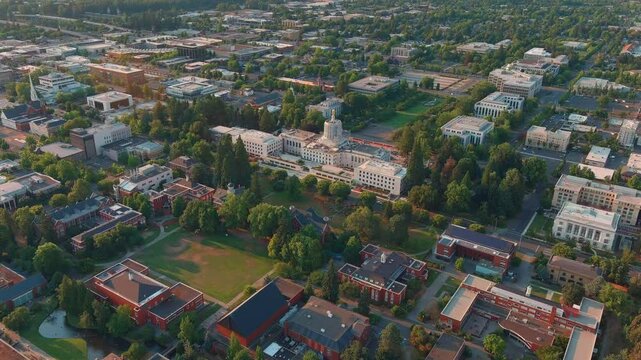 Salem, Oregon, the State Capitol Building in renovation, Willamette University campus and cityscape - aerial parallax
