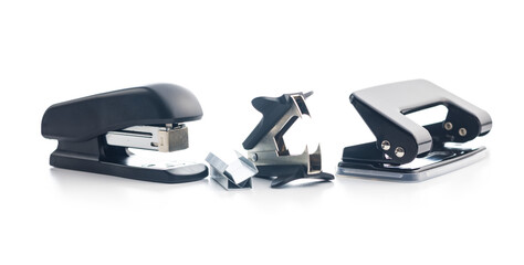 Office equipment. Stapler, staple remover and hole puncher isolated on white background.