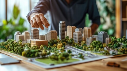 Architect Planning Urban Expansion with Model. Architect plans an urban expansion project by adjusting a detailed scale model of a city, emphasizing green areas and modern high-rises.