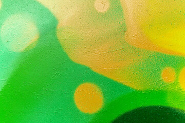 bright colorful pattern of beautiful street wall with art graffiti background. Vivid modern urban texture for wallpaper and design