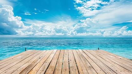 Fototapeta premium Wooden Dock Extending Over a Calm Blue Ocean with White Clouds in the Sky