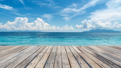 Fototapeta premium Wooden Deck Overlooking a Calm Ocean With Clouds and Mountains in the Distance