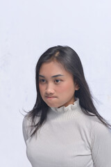 Fototapeta premium Young Asian Woman Poses and Face Expressions