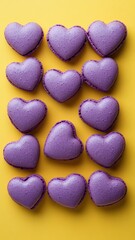 Obraz premium French sweet Violet heart macaroons on yellow background,Pastry shop card with copy space,french purple macaroons,Paris Pastry,bakery and branding valentine couple concept,copy space.