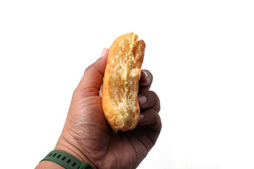 hand holding bread with butter and sugar isolated on white background, good for article, recipe and commercial