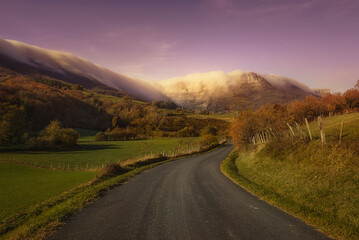 Dawn in Orduña with a rural road heading towards the Sierra Salvada mountains