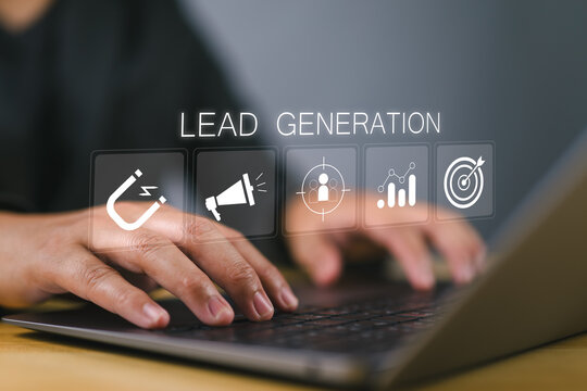 Lead Generation concept. Businessman using laptop with lead generation icon on virtual screen. Finding and identifying customers for business products or services.