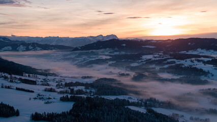 Sunset in Allgäu in the german alps in winter