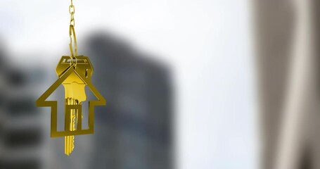Golden house keychain animation over blurred cityscape background - Powered by Adobe